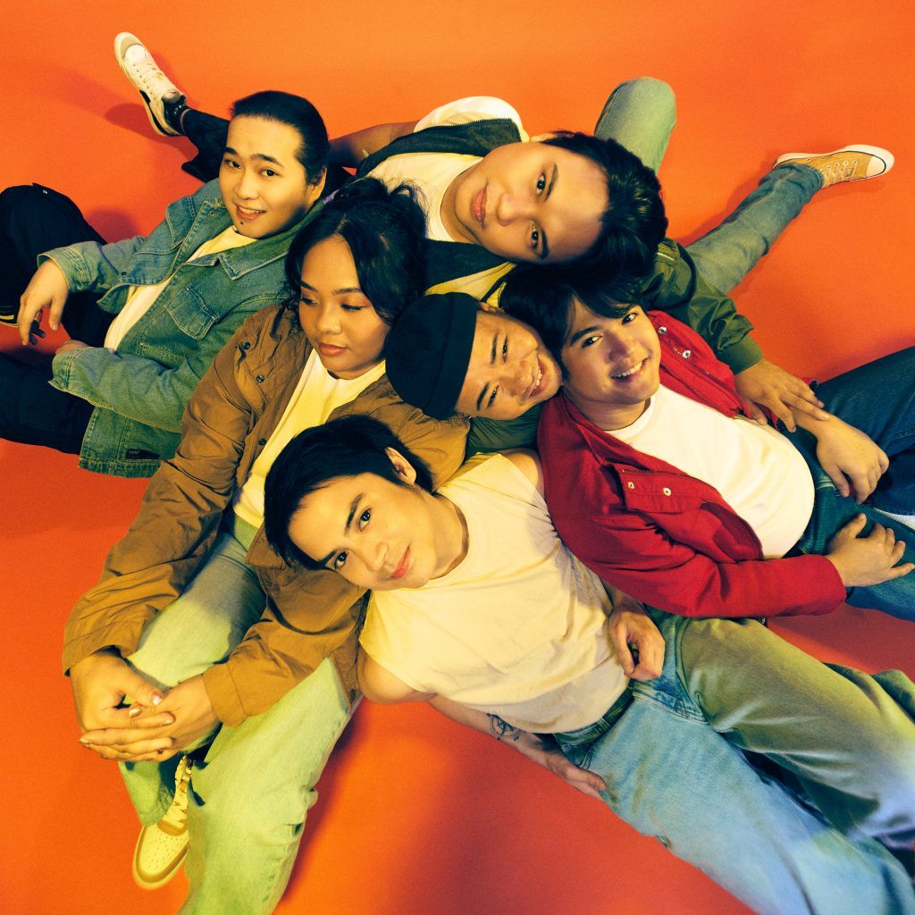 Louise Bayas, John Abat, Jun Arbiso, Jake Vargas, Victor Guison, Jessie Talaboc– members of the six-piece band Dear Dina poses in the camera.